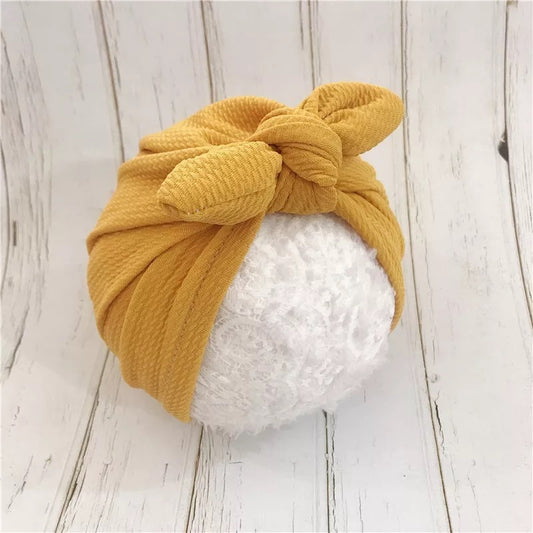 Gorro de bebé con lazo